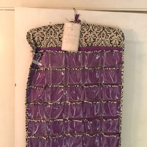 Hanging makeup holder